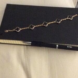 Faux gold four leaf clover